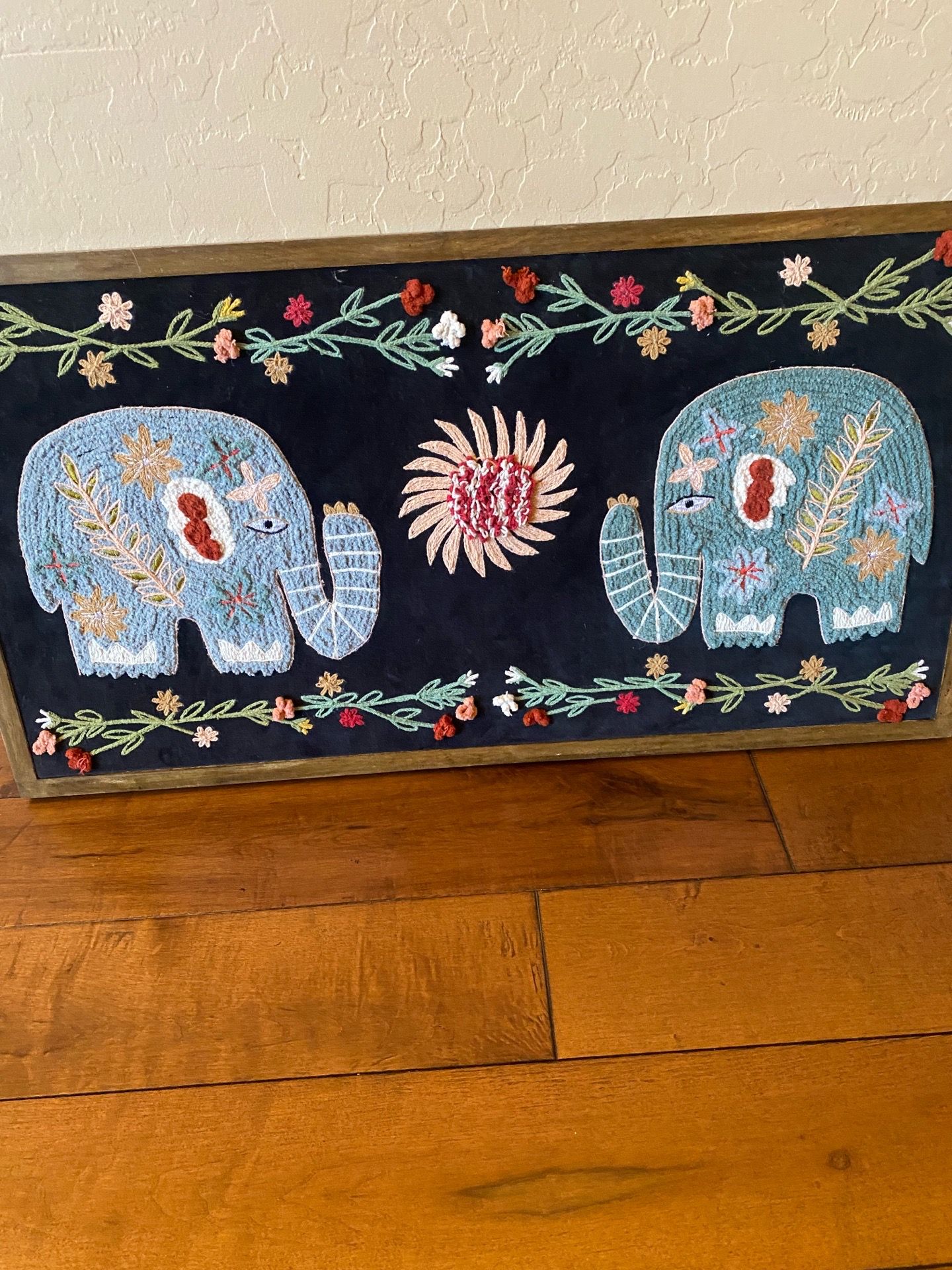 World market two blue elephants embroidered floral wall art hanging. Tag price $79. Large ! Bo Ho .