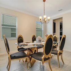 Elegant Glass Dining Table Set – 6 Chairs (Modern Gold/Black)