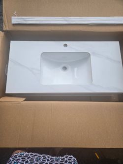 White Marble-Look Vanity Top with Integrated Sink