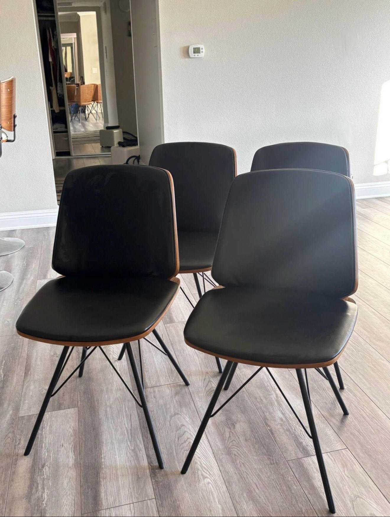 (4) Mid-Century Dining Chair in Black Faux Leather with Black Powder Coated Metal Legs