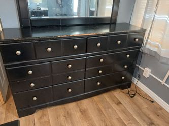 Black 6 draw dresser with all its knobs