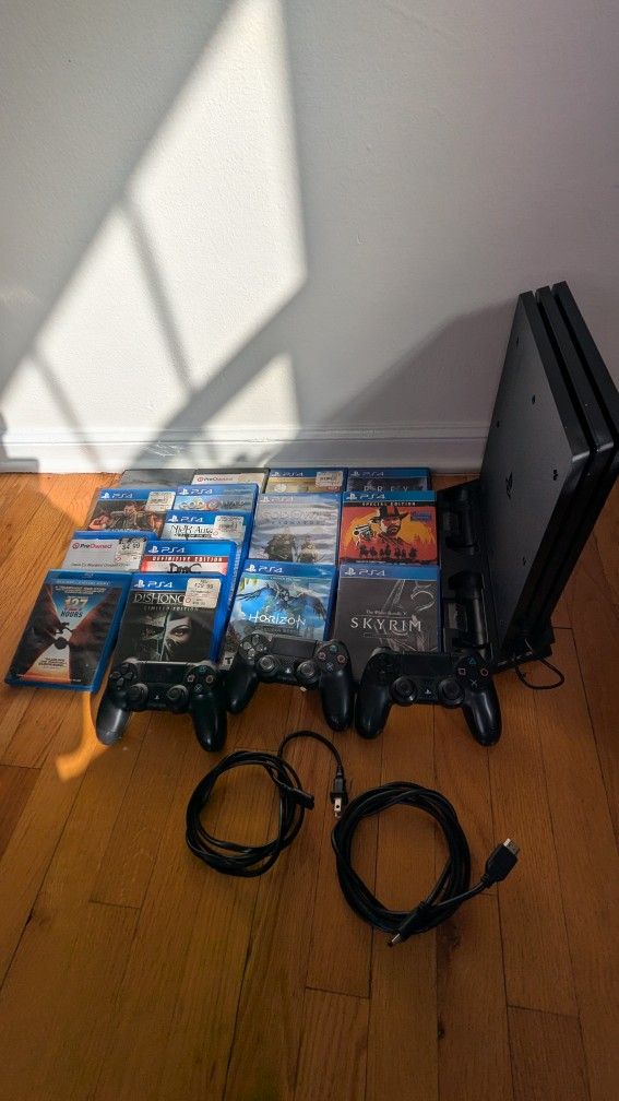 Ps4 Pro 1TB. 15 Games, 1 Blue Ray, 2 Controllers And Cables