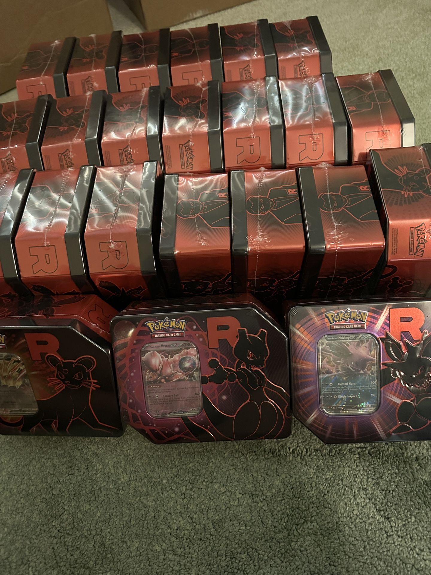 Team Rocket Tins