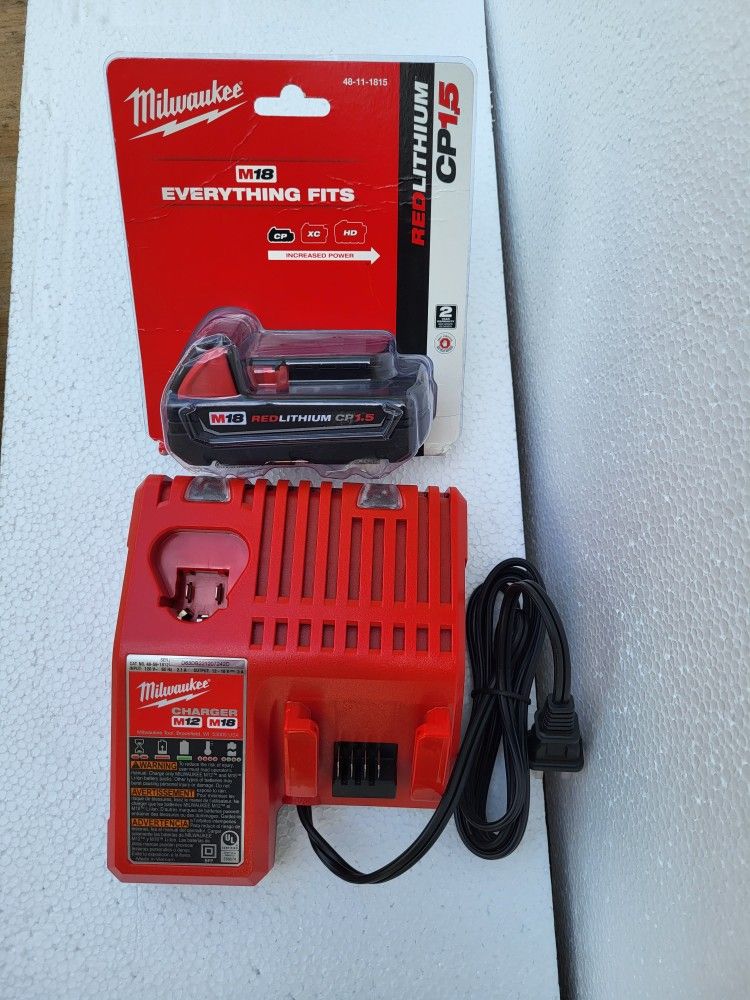 MILWAKEE M18 BATTERY 1.5 PLUS BATTERY CHARGER NEW