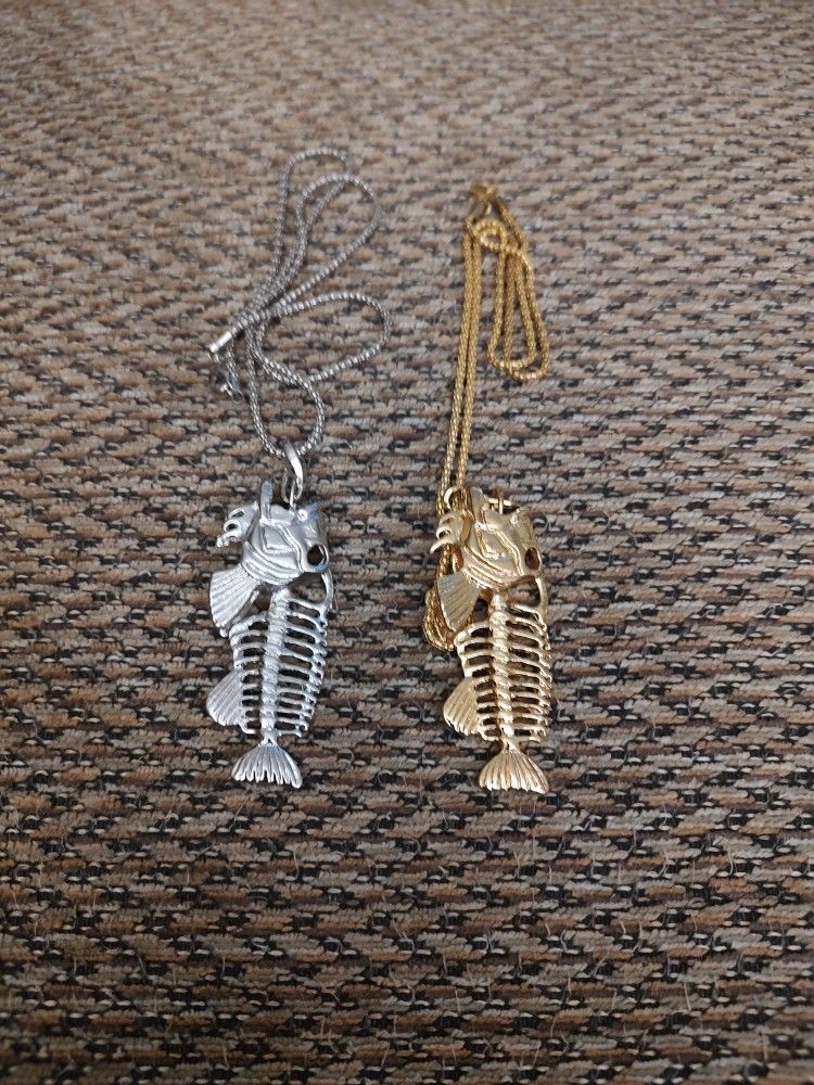 SKELETON FISH NECKLACE.  24 IN. CHAIN. $10 EACH.   NEW. PICKUP ONLY