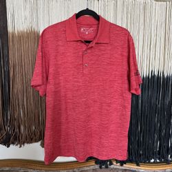 Heathered red Bermuda Sands polo with Kings River Golf and Country Club 2021 Men’s Invitational embroidery on the left arm; perfect condition