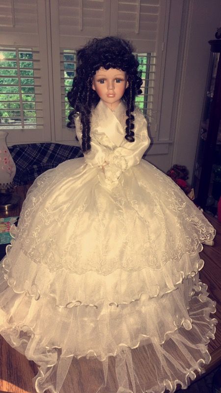 Antique porcelain umbrella doll