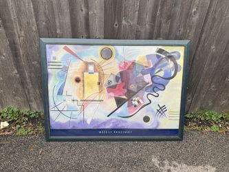framed print of the painting Yellow-Red-Blue by Wassily Kandinsky  