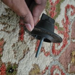 Honda OEM spare tire hold-down screw or anchor bolt retainer,