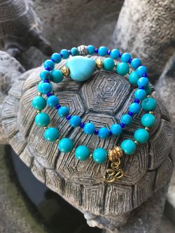 Turquoise stretch bracelets with om charm size 7.5 inches