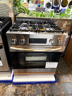 Estufa stainless steel nueva 2 años de garantía a Pagos