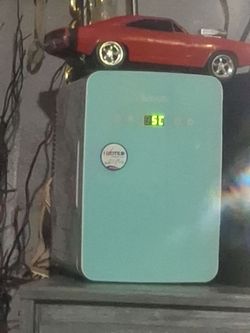 Small refrigerator if it's about a six pack in there