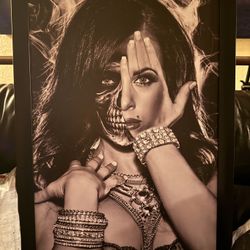 Framed artwork titled "Two Face" by artist Daveed Benito