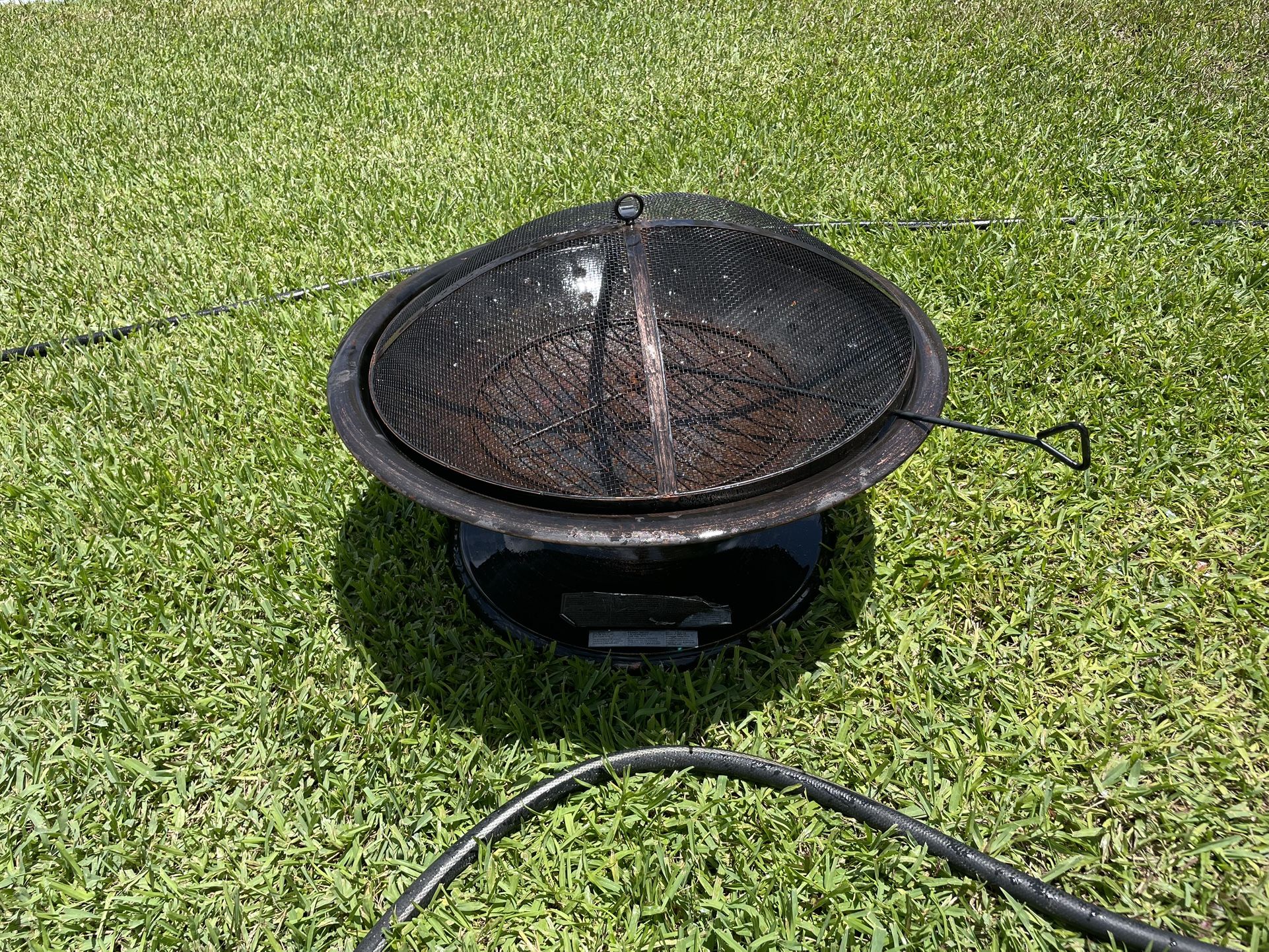 Fire pit fireplace with protective weather cover