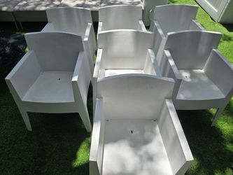 Seven designer chairs $60 each.