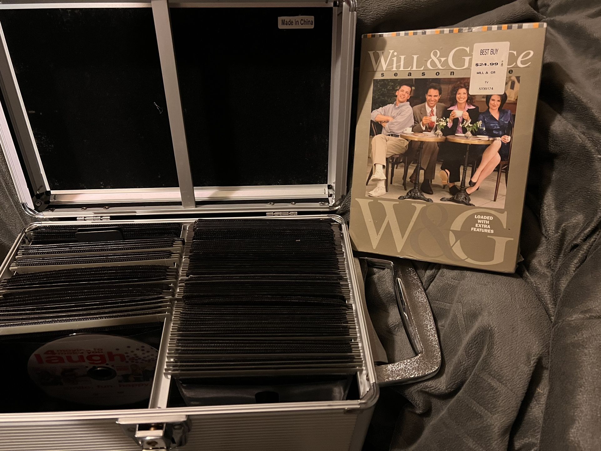 1of3 40 ++ DVDs with Silver case and an itemized spreadsheet PLUS 25 BNIP DVDs.