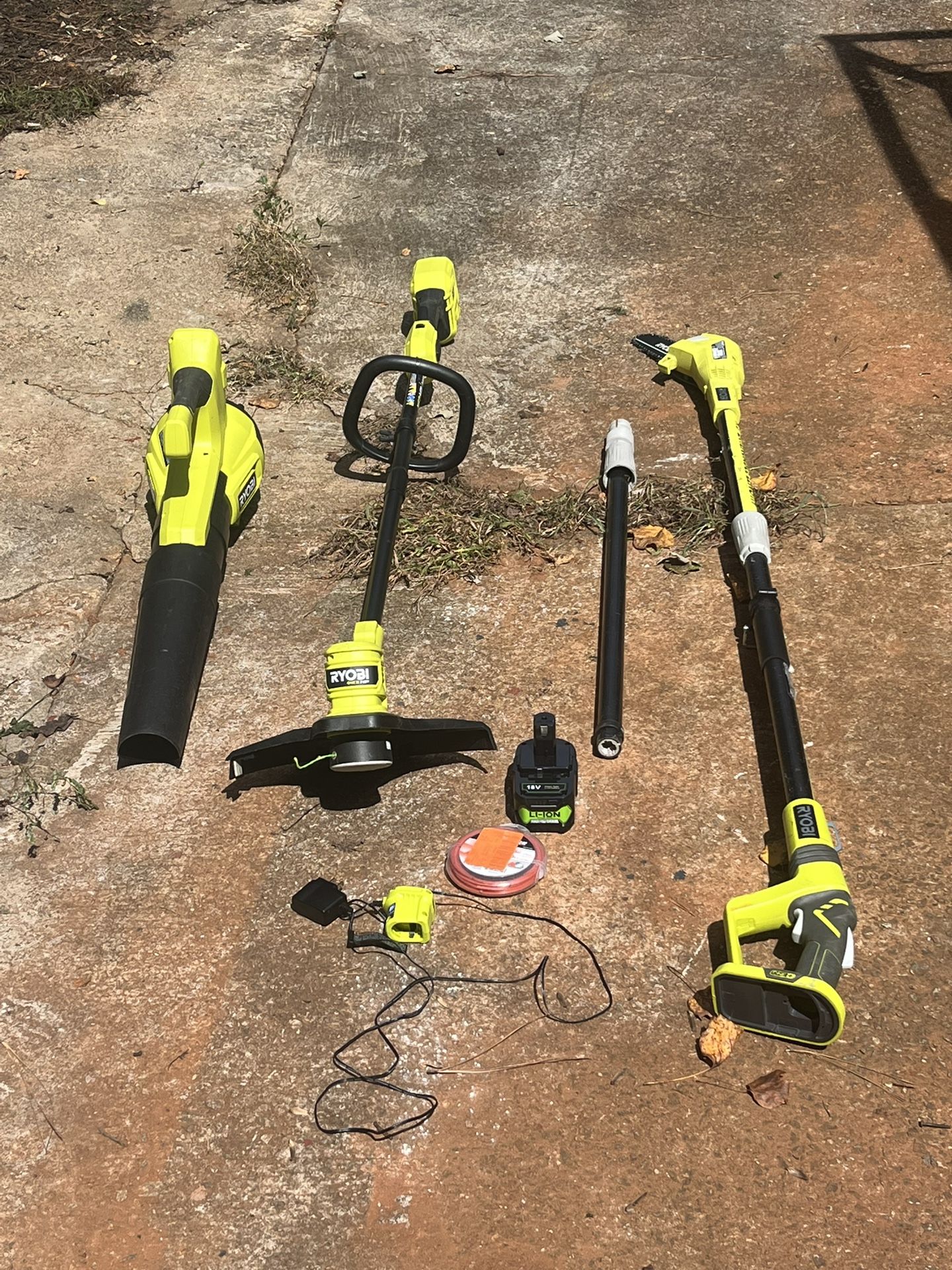 Ryobi 18 V string trimmer, leaf blower pole saw battery charger $140