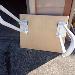 Wall-mounted hand rails for toilet