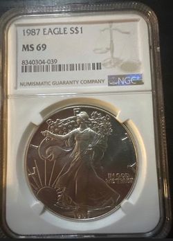 1987 American Silver Eagle — NGC Certified MS69   Certification #: (contact info removed)‑039