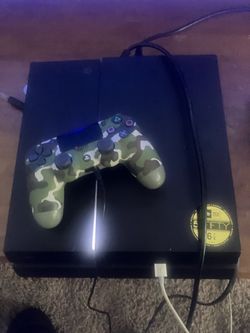 PlayStation 4 Console with Camo DualShock 4 Controller