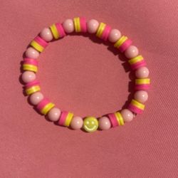 Pink And Yellow Bracelet with A Smiley Face 