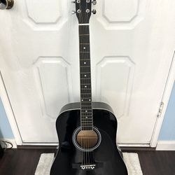 Huntington Acoustic guitar $75 or best offer 