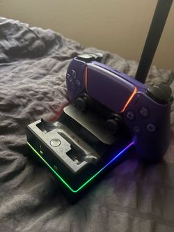 Ps5 controller, Astro A10 headset, and charging dock and headset stand