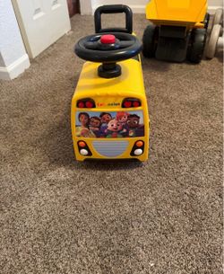 CoComelon Musical School Bus Ride-On Toy