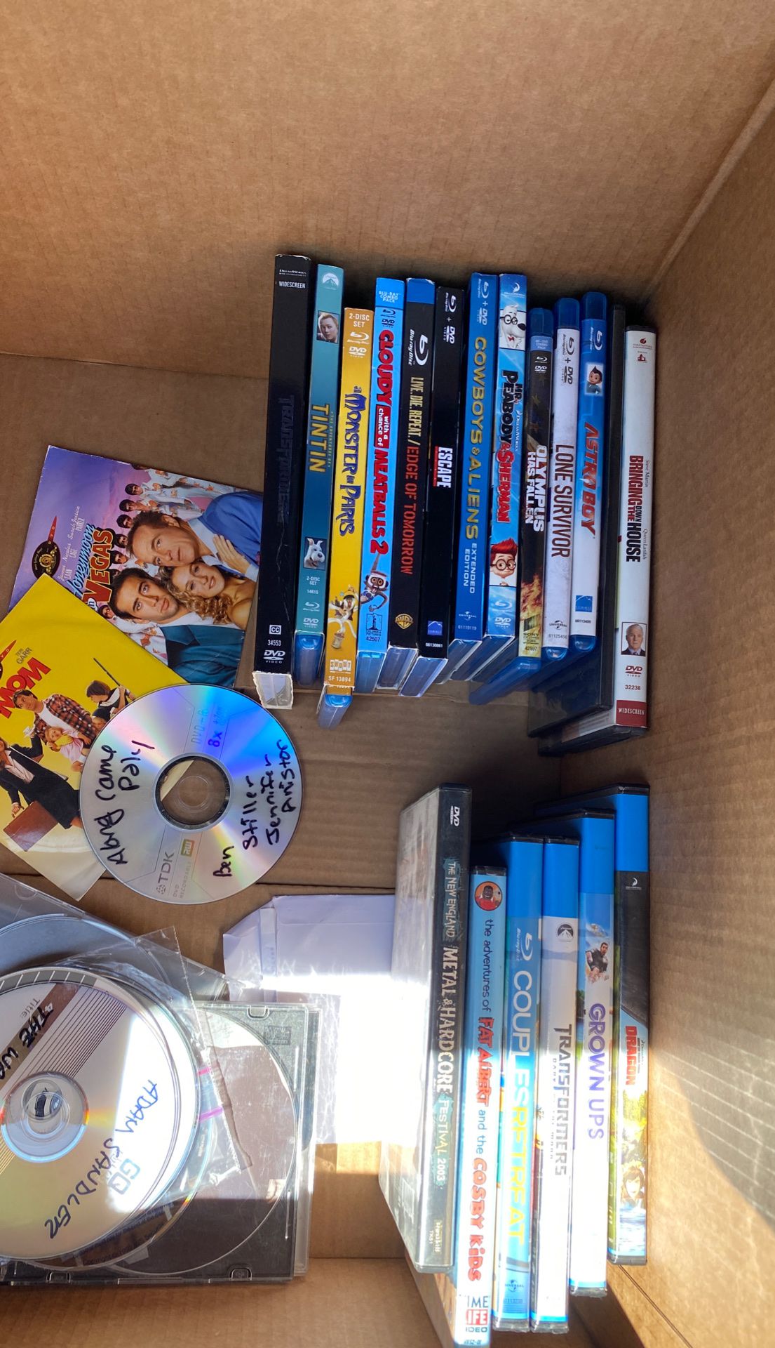 Box of blue ray and dvds.