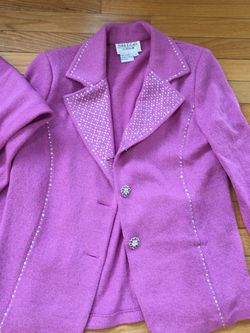 Woman’s suit size 14