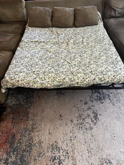 Sectional couch with pull out full size bed + mattress