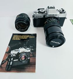 MINOLTA XG-M Film Camera w/ MD Minolta 50mm 1:2 Lens & 135

mm