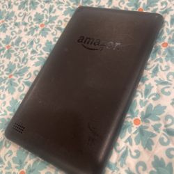 Amazon Kindle Fire Tablet And OnePlus 8T