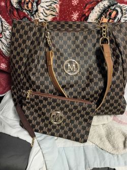 "M". Purse and matching makeup bag