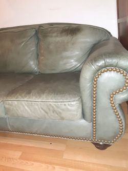 Nics Leather Sofa & Chair... a tear in the back of chair