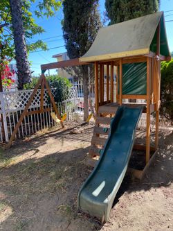 Swing set with slide