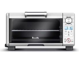 SCRATCH AND DENT item .. a few imperfections nothing major  Breville BOV450XL Mini Smart Countertop oven