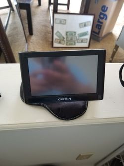Like new GPS with stand and charger