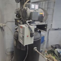 Baldor Industrial Air 7.5 HP, 80-gallon, two-stage air compressor.
