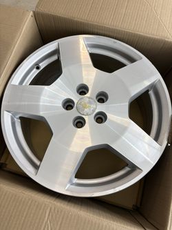 Set of 4 Chevy 18” Aluminum Rims. 1 great condition 3 scratched up as shown. Retail value $1,600. Selling all four $500. Text or call .