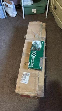 6ft. Green Christmas tree with stand and a new box of white lights