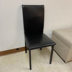 Black Chair with metal legs, in excellent condition  