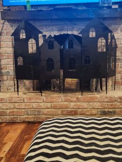 Pair of fireplace screen/ candle holders