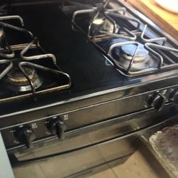A Year Old 4 Burner Stove