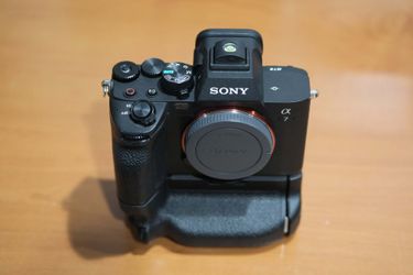 Sony a7iv camera w/ Sony vg-c4em battery grip.