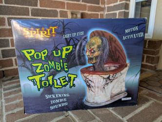 Spirit pop up zombie toilet