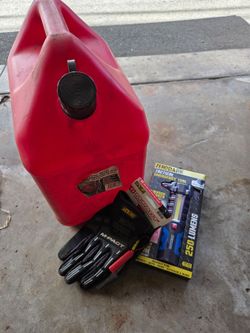 5 gal gas can w/ some free roadside stuff