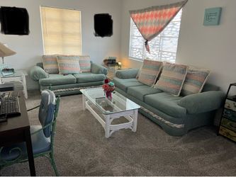 Pull out sofa bed and love seat with 3 matching table set
