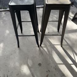 MUST GO TODAY! 2 Stools.  Stackable One Black One Bronze, Bar Seats