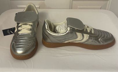 Brand new Women’s fold over silver sneakers sizes 6, 7 & 8 $12.00 each